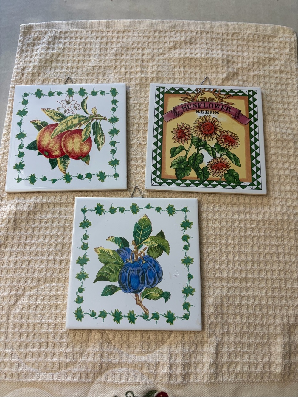 Sunflower Seed Ceramic Wall Tile Trio with Fruit Motifs - Yellow & Green Accents